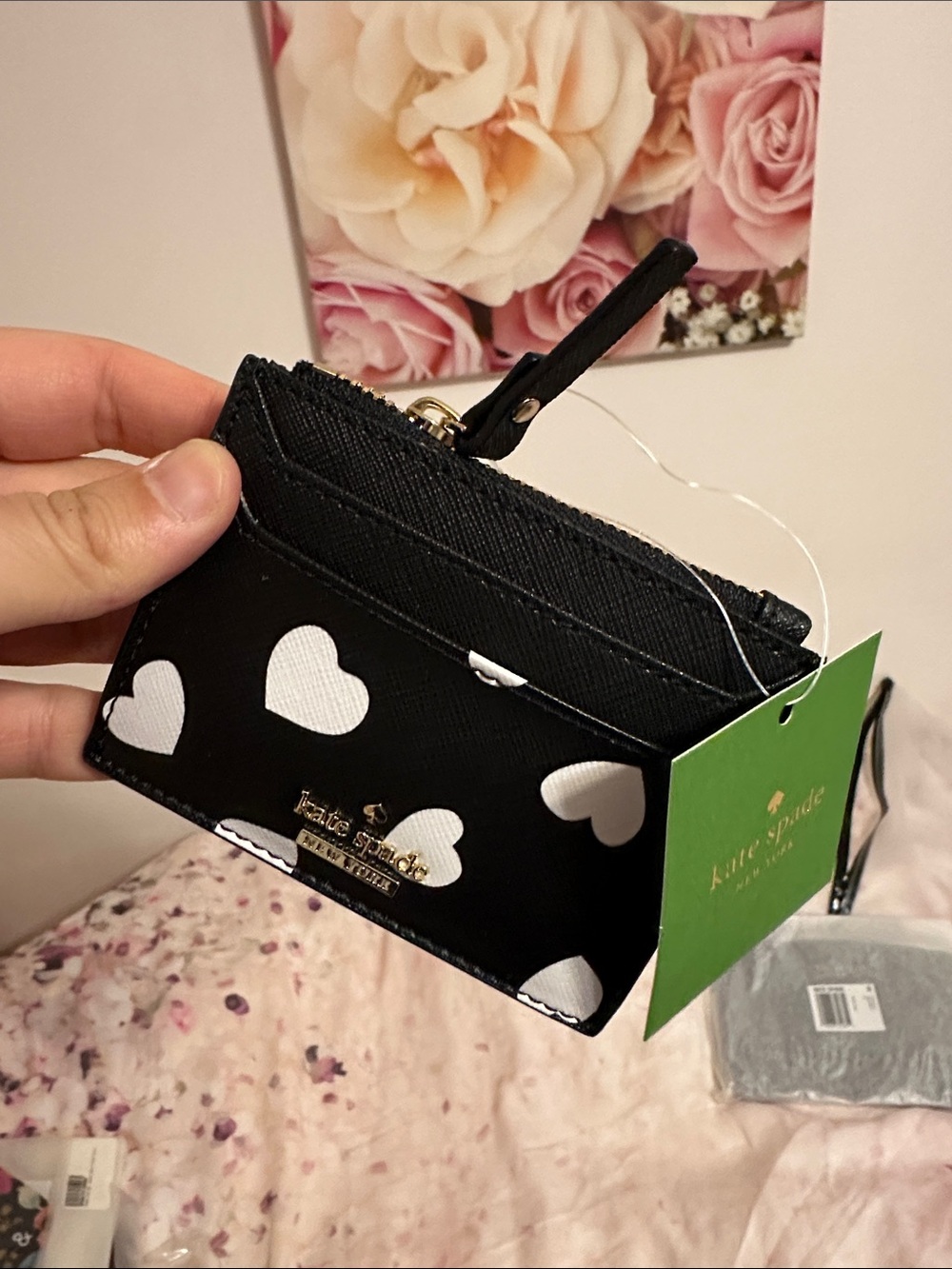 kate spade black card case with white heart print and gold logo